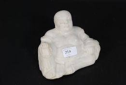 A good Chinese polished white veined Chinese marble seated figurine of Buddha