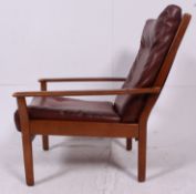 A superb pair of matching early twentieth century low lounge/ arm chair, with wooden show frame.