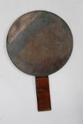 A 19th century bronze Chinese oriental hand mirror.