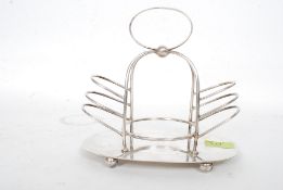 A good 20th century silver plate toast rack bearing initials for RNH