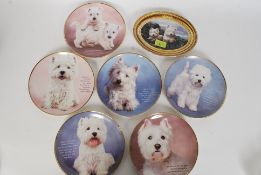 A collection of Danbury collectors plate each depicting Highland West Terriers marks to rear