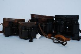 A collection of cased binoculars to include Prismatic,