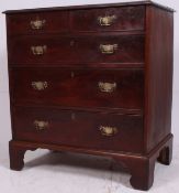 A 19th century Georgian mahogany chest of drawers raised on bracket feet with 2 short over 3 deep