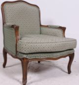 A French stained beechwood show wood framed fauteuil armchair The back seat and arm pads