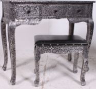 A contemporary Islamic style silvered white metal  dressing table and stool of decorative design