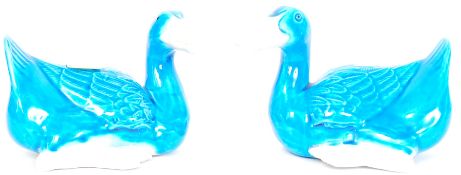 A pair of 20th century Chinese turquoise glazed ducks,