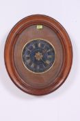 A 20th century French oeil de boeuf clock having blue dial marked for Marshall of Paris,