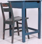 A retro 1950's childs painted school desk with hinged top together with a matching chair.