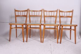 A set of four 1950's vintage  retro beech wood kitchenette dining chairs with original vinyl seat