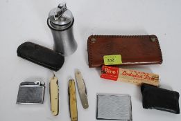 A mixed lot to include penknives, stamp holder, vintage spectacles and other misc items.