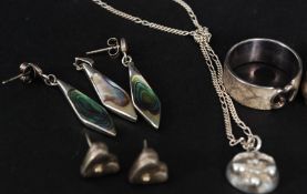 A collection of silver to include ladies rings and earrings.