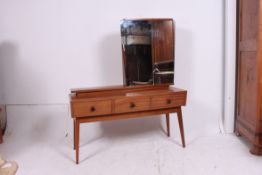 An excellent vintage retro 1950's dressing table in teak with unusual sliding mirror door with