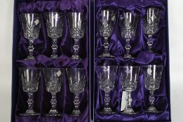 2 boxed sets of Edinburgh crystal glasses.