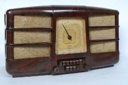 A vintage 1940's Art Deco bakelite large GEC twin speaker radio.