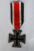 A German Nazi WWII Second World War Iron Cross, 2nd class, with ribbon. Dated 1813 & 1939.