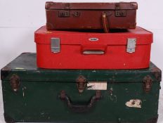 A vintage early 20th century steamer trunk suitcase together with a retro red Antler suitcase and