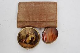 An early  20th century Agate and gilded metal oval shaped pill box with hinged centre.
