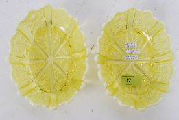 A pair of opalescent yellow pressed glass fruit bowl and vase by George Davidson,