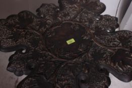 A good 20th century carved oak leaf merchants folding table.