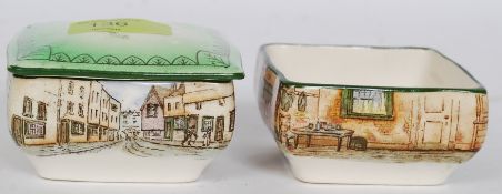 A pair of Royal Doulton Dickens Ware trinket pots marked 2973 one being The Artful Dodger and the