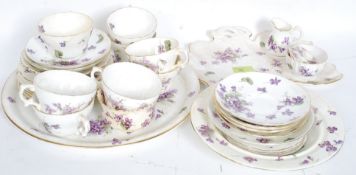 A 19th century Hammersely china part tea service comprising tennis set, tray, cups, saucers etc,
