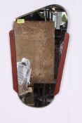 An Atomic 1970's style bevelled edge mid century mirror with Teak drop in edge frame