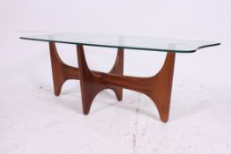 A retro Danish style teak and glass topped coffee table.