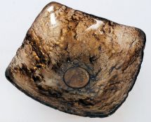 An unusual 20th century studio glass dish, in a gilt brown colouring,