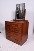 A 1940's post war Heals style mahogany dressing chest of drawers having bank of drawers to chest