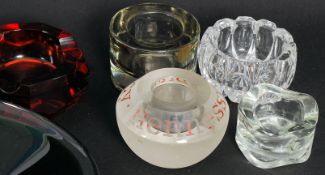 A collection of 20th century studio / art glass to include tea light holders,