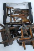 A good selection of assorted vintage woodworking tools to include plough planes, spoke shaves,