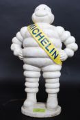 A 20th century vintage style cast iron  statue of Bibendum, the Michelin Man. 15