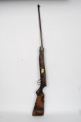 A vintage 1960's GDR Haencel 68mm air rifle having wooden stock and break neck action
