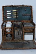 A vintage early 20th century motoring / automobile sports car picnic hamper.