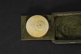 A  fabulous easel mounted pocket watch style clock set within leather case.