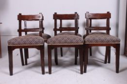A set of 6 19th century eclesiastical  Victorian dining chairs raised on squared supports with