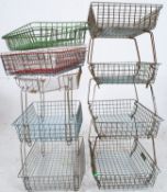 A set of original 1960's Beanstalk resin covered wirework green Industrial filing paperwork stands.