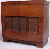 A 1950's retro vintage Monarch radiogram having inset BSR deck.