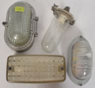 A collection of vintage 20th century Industrial bulkhead lights to include Coughtie of Glasgow,