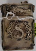 A very ornate Chinese silver metal cigarette case,