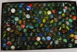 A collection of vintage glass marbles to include bulls eyes etc please see images