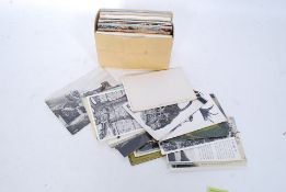 A collection of vintage postcards to consist of paleontology / dinosaurs, architectural,