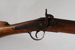 A 19th century British SB Sporting flintlock percussion cap e having 17mm bore having impressed