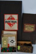 A vintage early Monopoly board game including box and board with paper pieces together with a