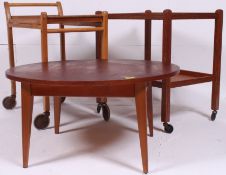 2 vintage 20th century tea trolleys together with a circular 1970's retro coffee table on tapered
