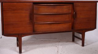 A vintage teak mid century sideboard with two outer sliding doors with contrasting curved handle