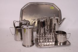 A 20th century set of Olde Hall hammered stainless steel tea service, including tray.