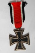 A German Nazi WWII Second World War Iron Cross, 2nd class, with ribbon. Dated 1813 & 1939.