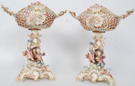 A pair of continental porcelain Italian centrepieces.