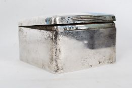 A silver hallmarked cigarette case bearing notation from Harptree house dated 1897.